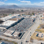 Drone view of Lake Drive Plaza shopping center and Hardy Rd.