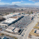 Drone view of Lake Drive Plaza shopping center and Hardy Rd.