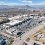 Drone view of Lake Drive Plaza shopping center and Hardy Rd.