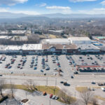 Drone view of Lake Drive Plaza shopping center and Hardy Rd.