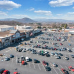 Drone view of Lake Drive Plaza Kroger parking and gas station.