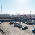 Drone view of Rushville Plaza Kroger storefront and parking.