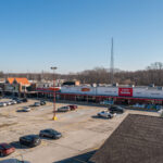 Drone view of Rushville Plaza True Value and other storefronts.