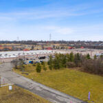 Drone view of Shoppes of Mason loading dock and access road.