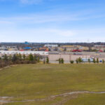 Drone view of Shoppes of Mason loading dock and access road.