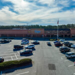 Singleton Square drone view of Kroger storefront and parking.