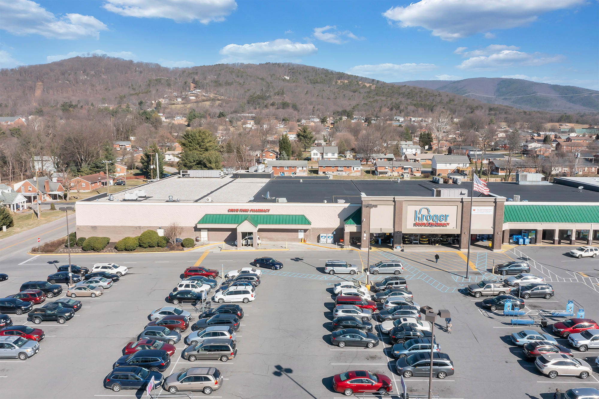 Spartan Square drone view of Kroger and pharmacy storefront.