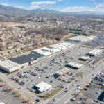 Drone view of Spartan Square shopping and Main St.