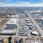 Drone view of Spartan Square with mountains in the distance.