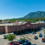 Cheyenne Meadows, King Soopers, US Bank and parking lot aerial view.