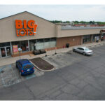 Woodland Crossing, Big Lots, Rent A Center and Acceptance Auto Insurance aerial view.