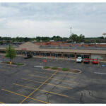 Woodland Crossing Heart City Health and Elkhart Nutrition parking lot aerial view.