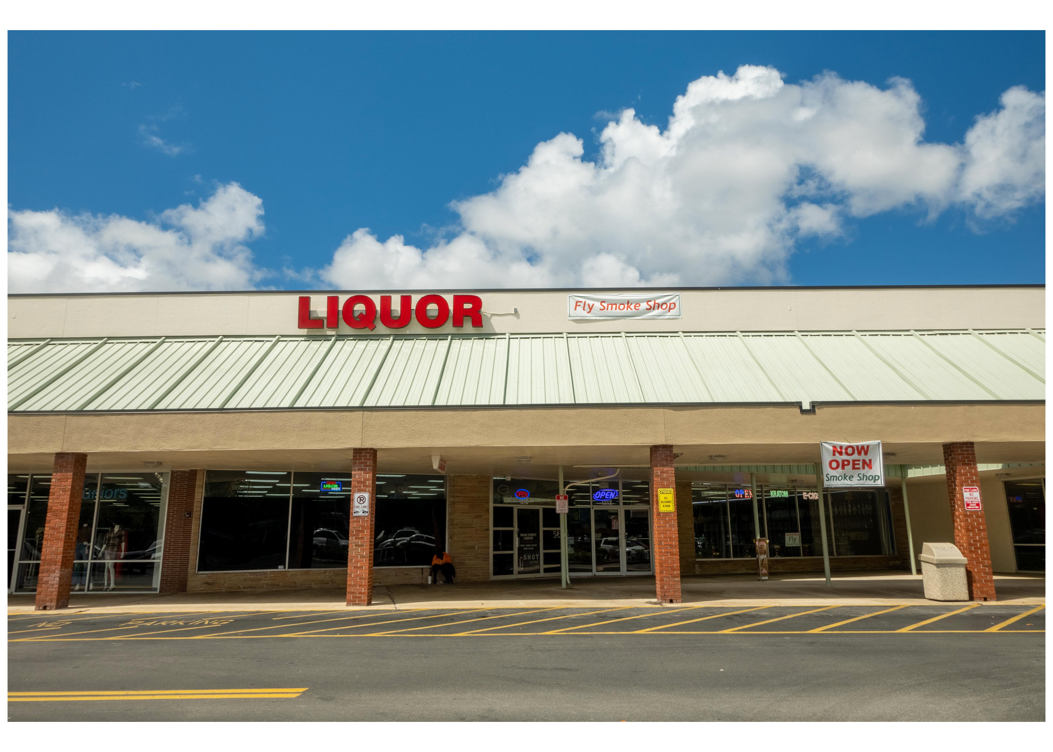Gainesville Shopping Center, Liquor and Fly Smoke Shop