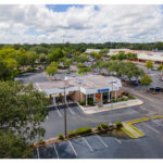 Gainesville Shopping Center, PNC Bank, parking lot aerial view.