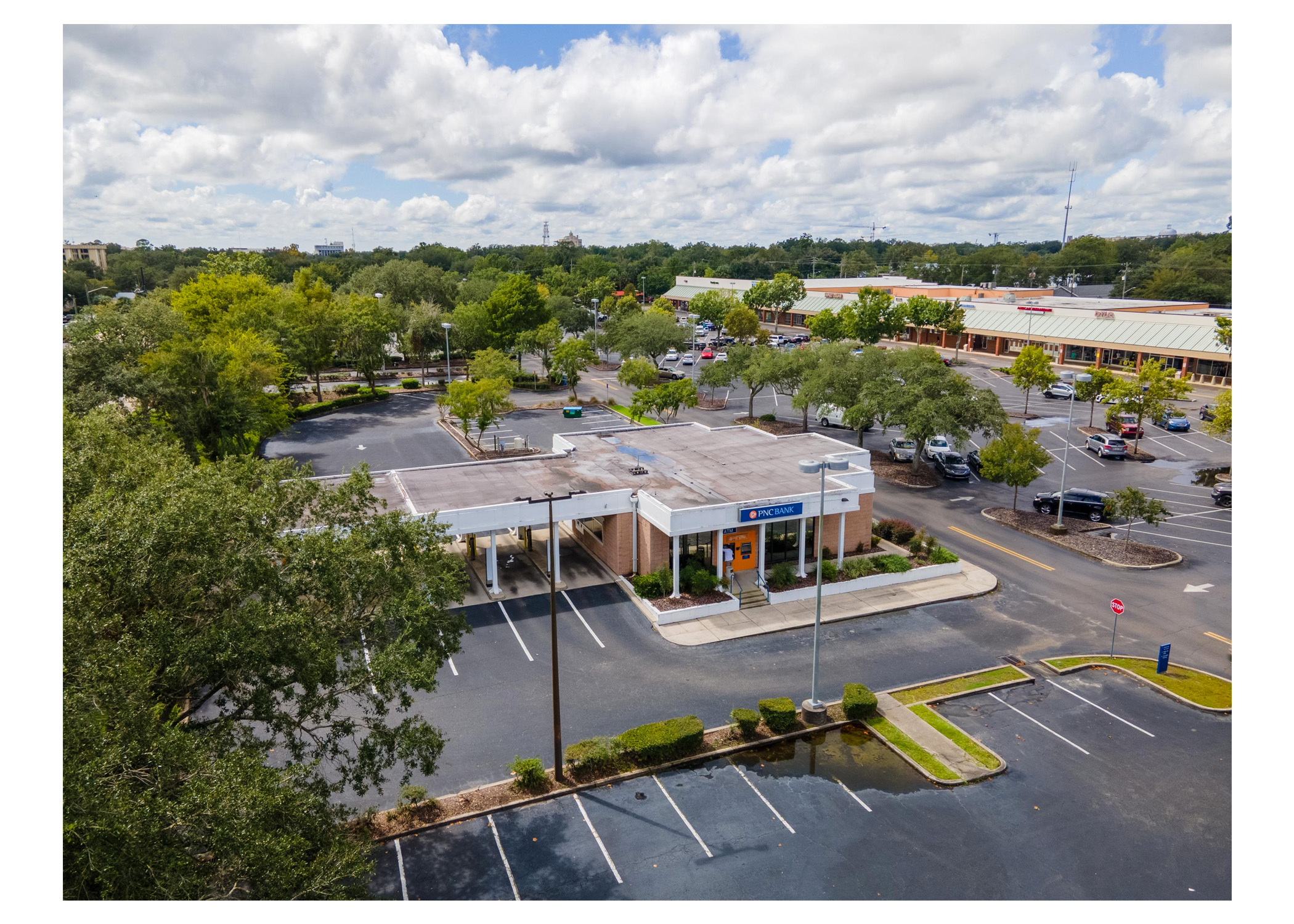 Gainesville Shopping Center, PNC Bank, parking lot aerial view.