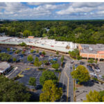 Gainesville Shopping Center, Publix, PNC Bank, Liquor and parking lot aerial view.