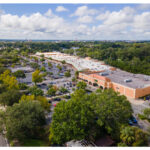 Gainesville Shopping Center, Publix, parking lot and NW2nd Street aerial view.