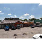 Plymouth Plaza, Pizza Hut, Dragon Express, and Laundromat Dry Cleaners front entrances.