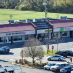 Linwood Square, Bank of America, Nail Trap, H&R Block and parking lot aerial view.