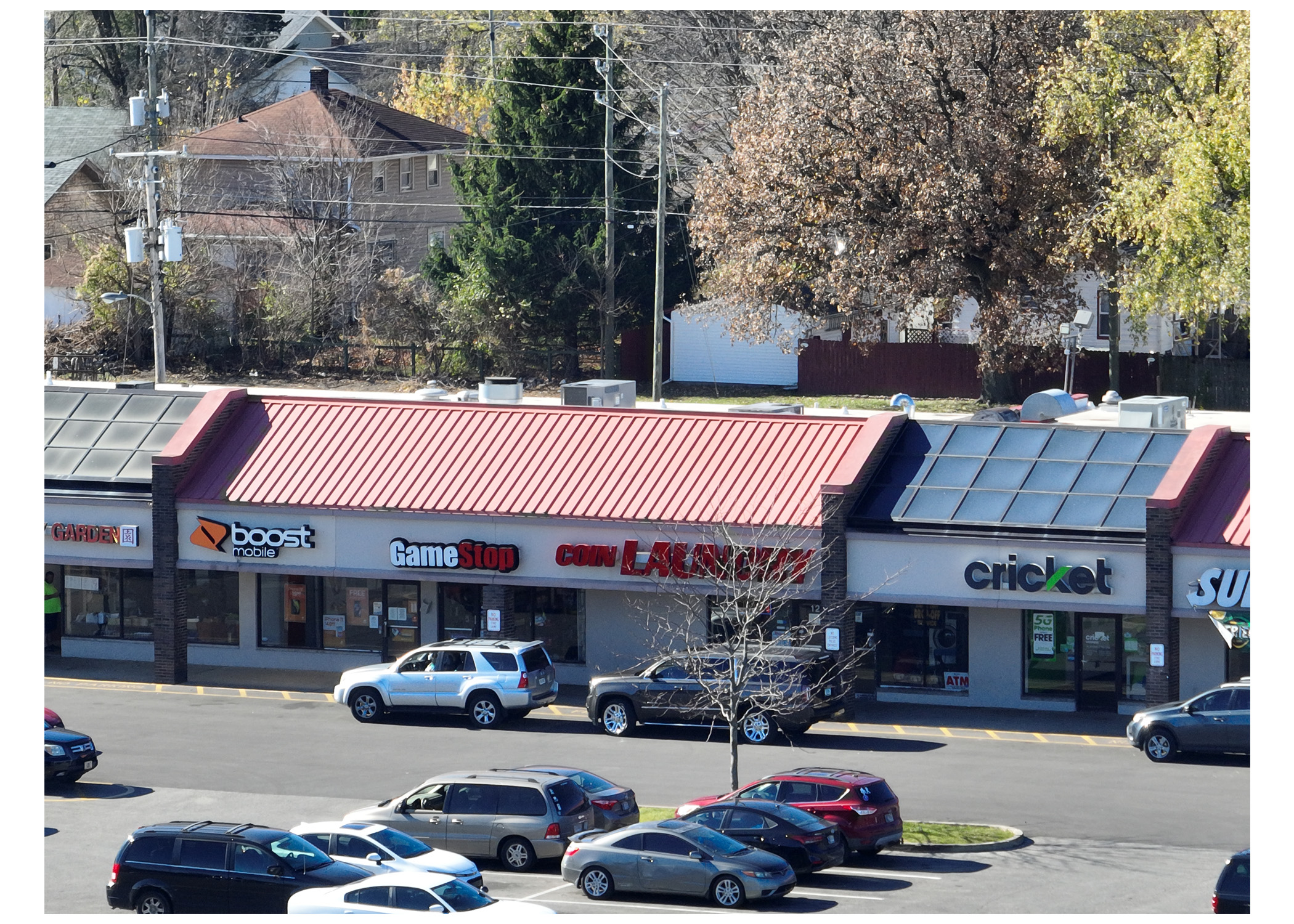 Linwood Square, Boost Mobile, Game Stop, Coin Laundry, Cricket, and parking lot, aerial view