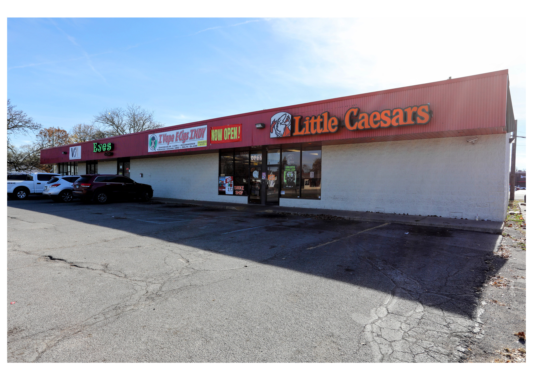 Linwood Square, Vaden's Firearms & Ammunition, Eyes by India, IVape eCigs Indy, and Little Caesars