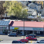 Linwood Square, Cricket, Subway, Wingstop, and parking lot, aerial view