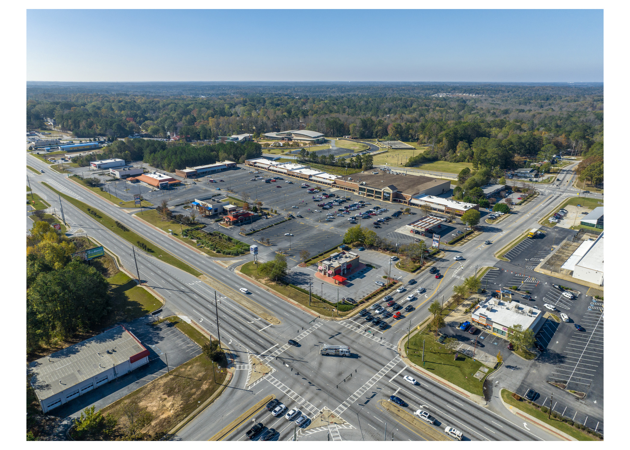 Merchants Square, Kroger, Panda Express, and parking lot. Route 85 and Bethsaida Rd intersection, aerial view.