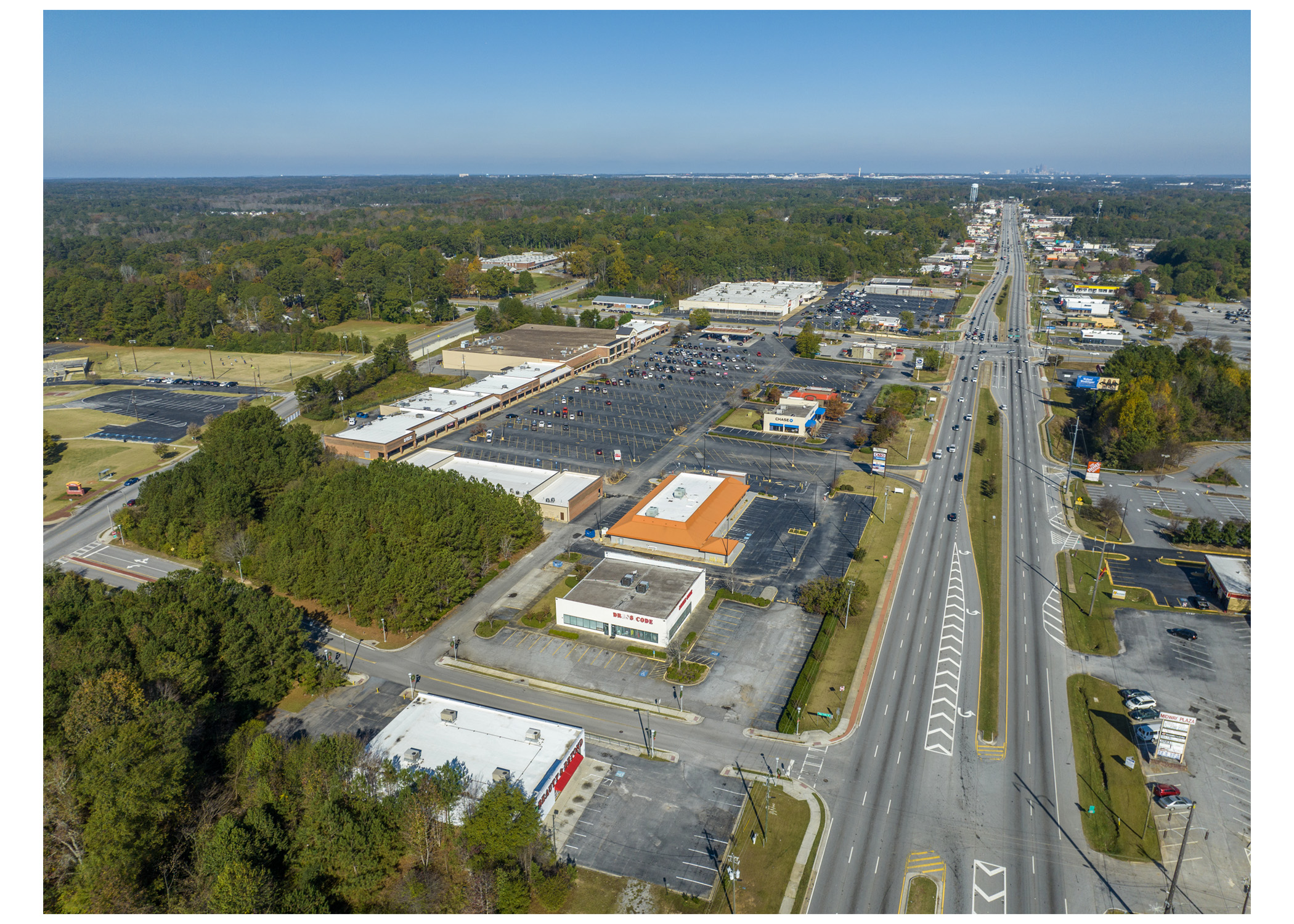 Merchants Square, route 85, Kroger, parking lot, and Chase Bank, aerial view.