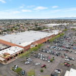 Glendale Palms aerial view, parking lot and shops.