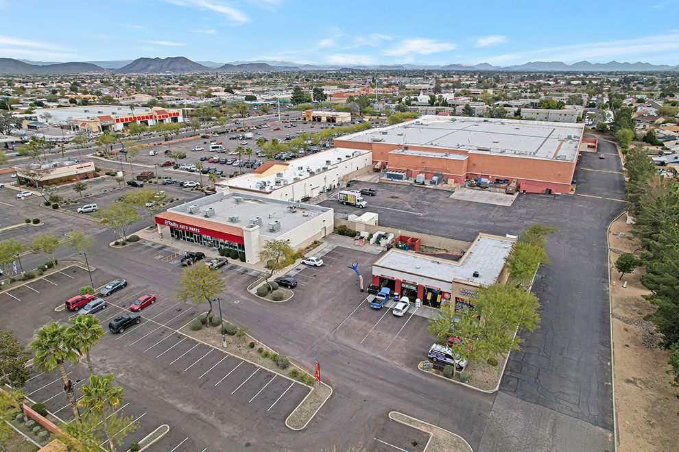 O'Reilly Auto Parts, parking lot and Glendale Palms aerial view.